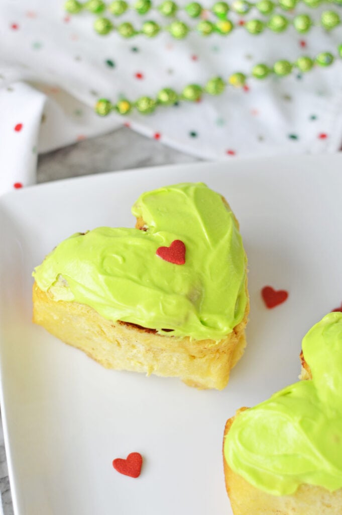 hearts on grinch cinnamon rolls